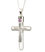 a silver shield cross